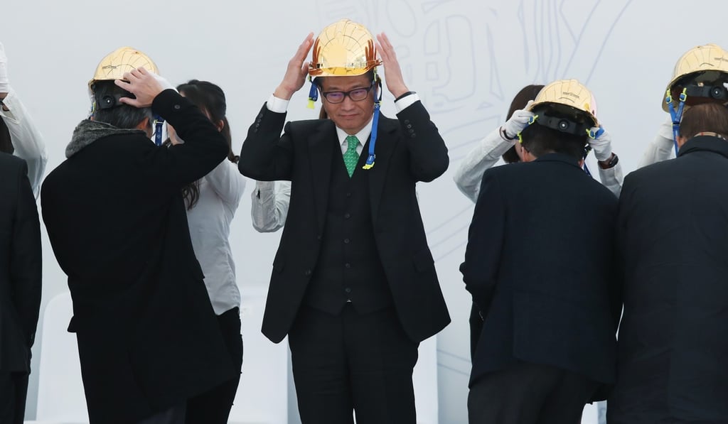 Financial Secretary Paul Chan Mo-po attends a ceremony to break ground on work to reclaim 130 hectares off the northern coast of Lantau Island. Photo: K.Y. Cheng