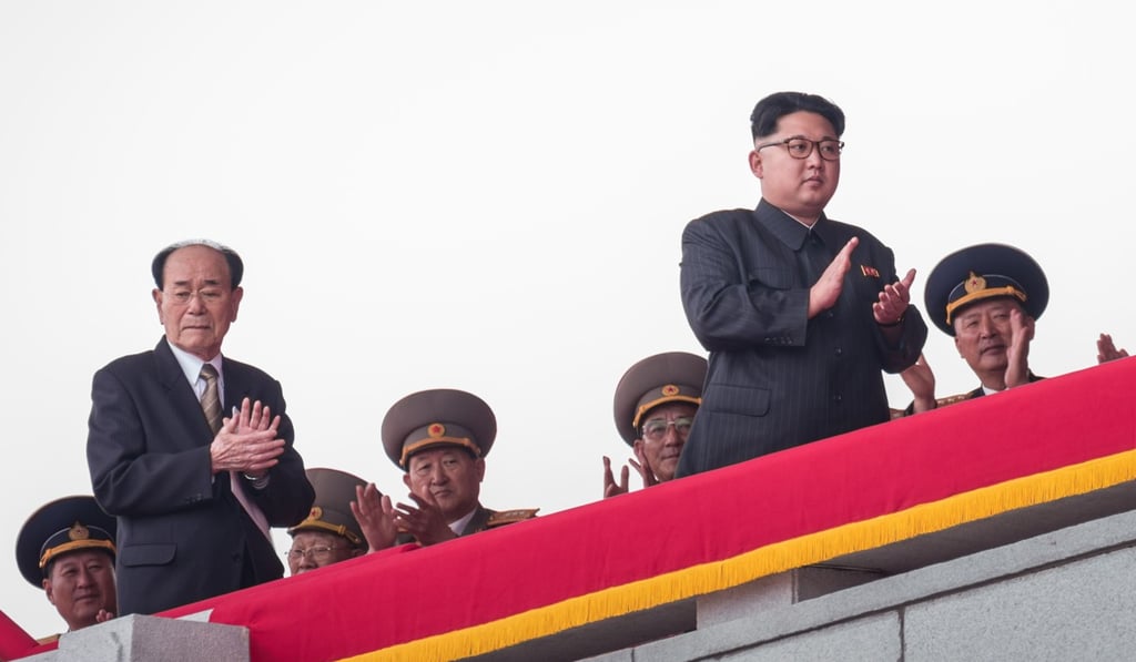 Senior official Kim Yong-nam (second left) is heading a North Korean delegation to South Korea. Photo: AFP Senior official Kim Yong-nam (second left) is heading a North Korean delegation to South Korea. Photo: AFP