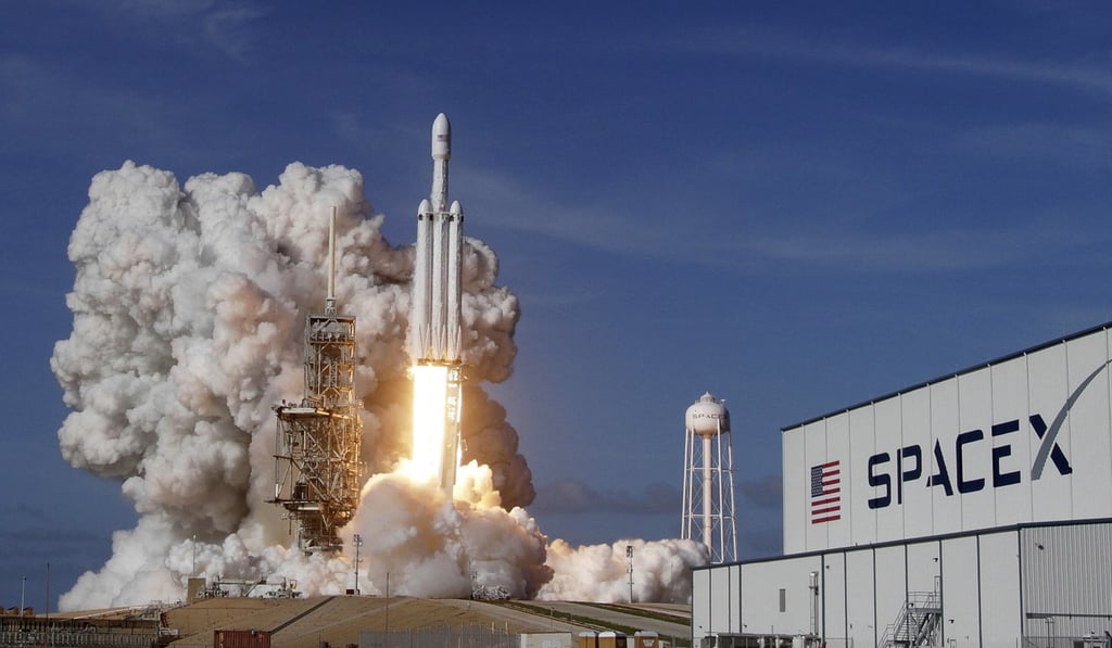 A Falcon 9 SpaceX heavy rocket lifts off from pad 39A at the Kennedy Space Center in Cape Canaveral on Tuesday. Photo: AP