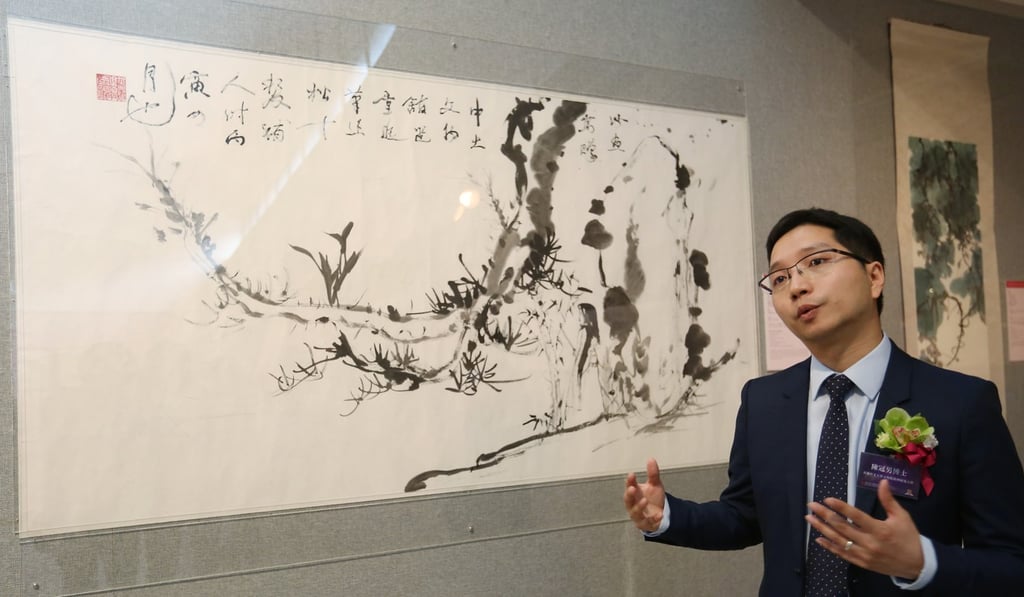 Research Assistant Curator of Art Museum, Dr Phil Chan shows Professor Jao Tsung-i’s artwork at a press preview at the Chinese University of Hong Kong’s Art Museum Exhibits. Photo: Xiaomei Chen
