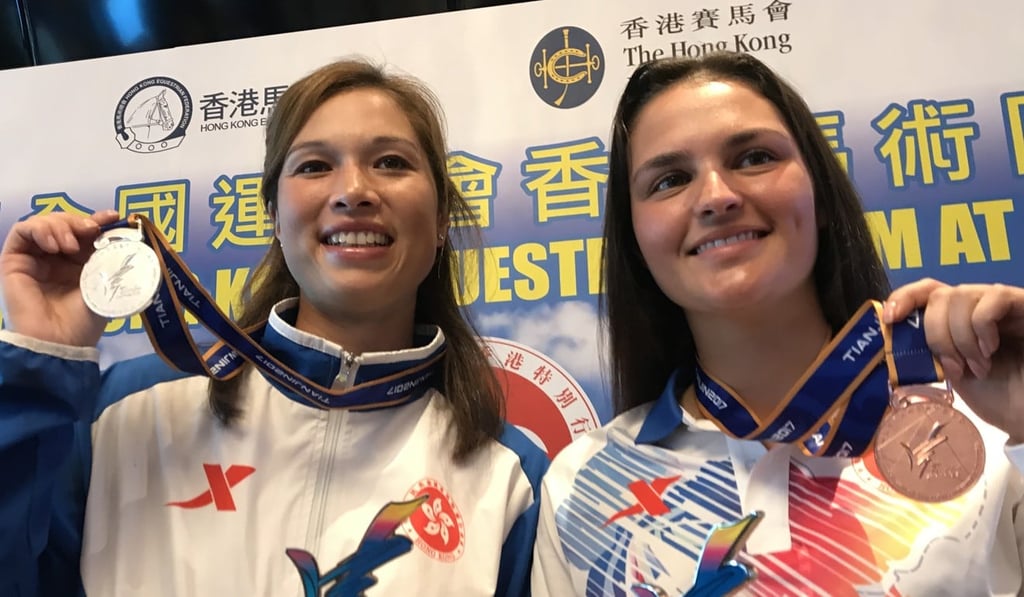 Hong Kong riders Jacqueline Siu (left) and Clarissa Lyra show off their equestrian medals from the 2017 National Games. Photo: Handout