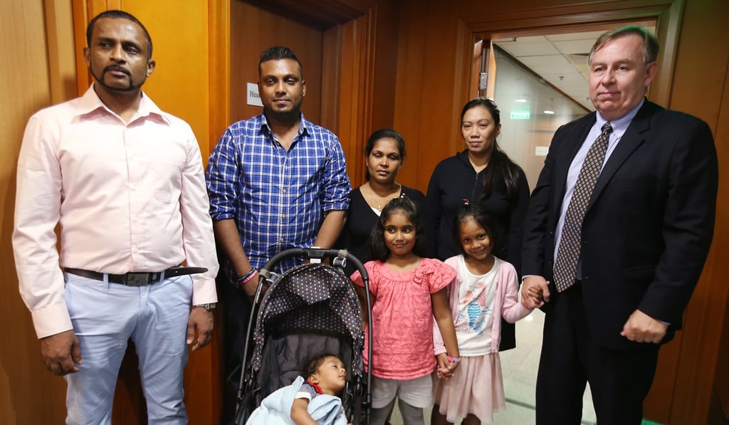 (Left to right) Ajith Pushpakumara; Supun Thilina Kellapatha; Nadeeka Dilrukshi Nonis; Vanessa Mae Rodel and lawyer Robert Tibbo appear at their appeal hearing at The Torture Claim Appeal Board in October 2017. Photo: David Wong
