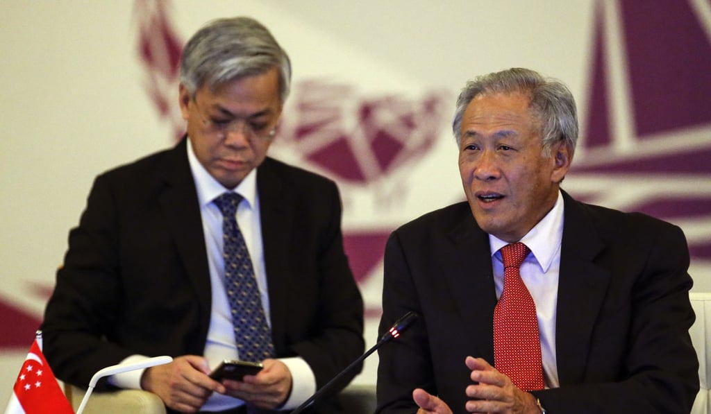 Singapore's Defence Minister Ng Eng Hen (right) gives his opening address at the Asean meeting on Tuesday. Photo: AP