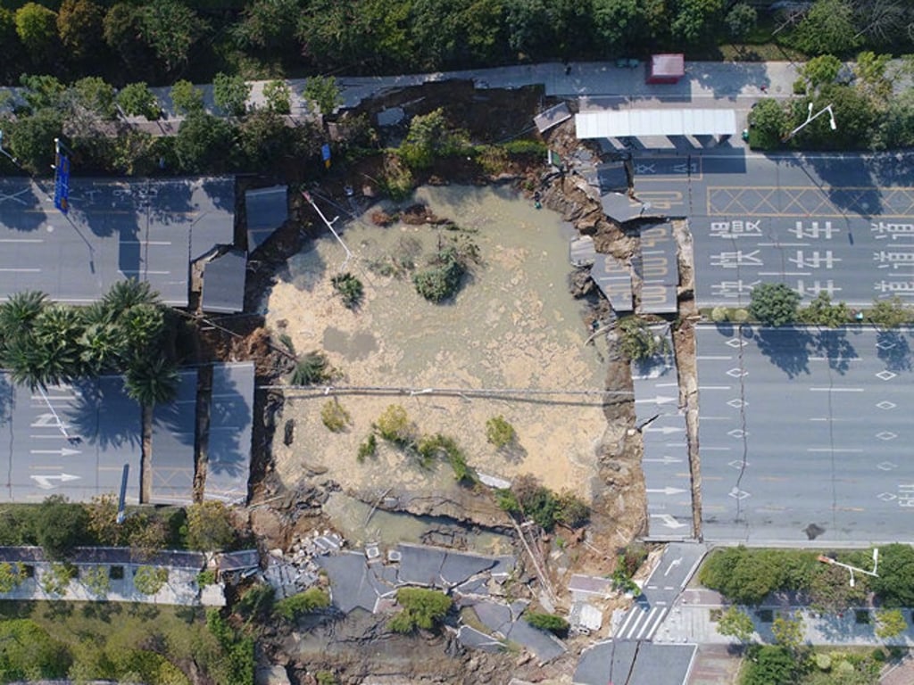 Nine people are being treated in hospital for injuries sustained in the road collapse, local authorities said. Photo: Weibo.