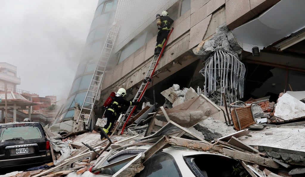 Firefighters look for survivors after the earthquake in east coast city Hualien. Photo: Reuters