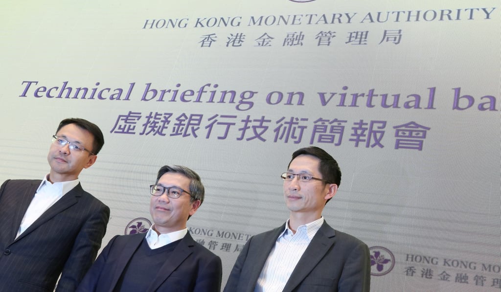 Raymond Chan King-wang, (from left) executive director for banking supervision at the Hong Kong Monetary Authority; Arthur Yuen Kwok-hang, deputy chief executive; and Brian Lee Wai-man, head of technology and liquidity risk, attend the HKMA’s technical briefing on virtual banking on Tuesday. Photo: Felix Wong