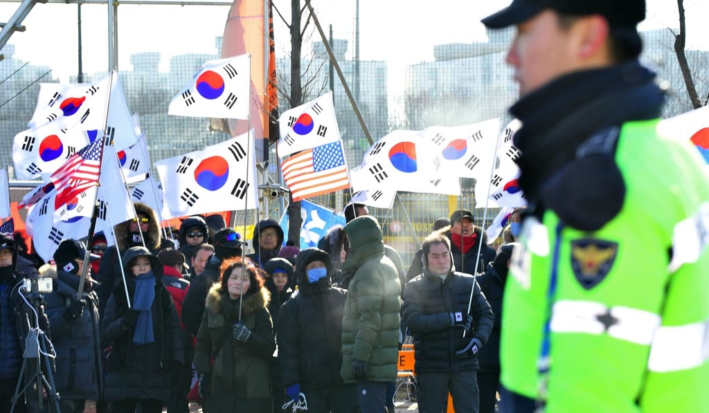 People protest against the unified Korea female ice hockey team in Incheon ahead of the Winter Games. Photo: AFP People protest against the unified Korea female ice hockey team in Incheon ahead of the Winter Games. Photo: AFP