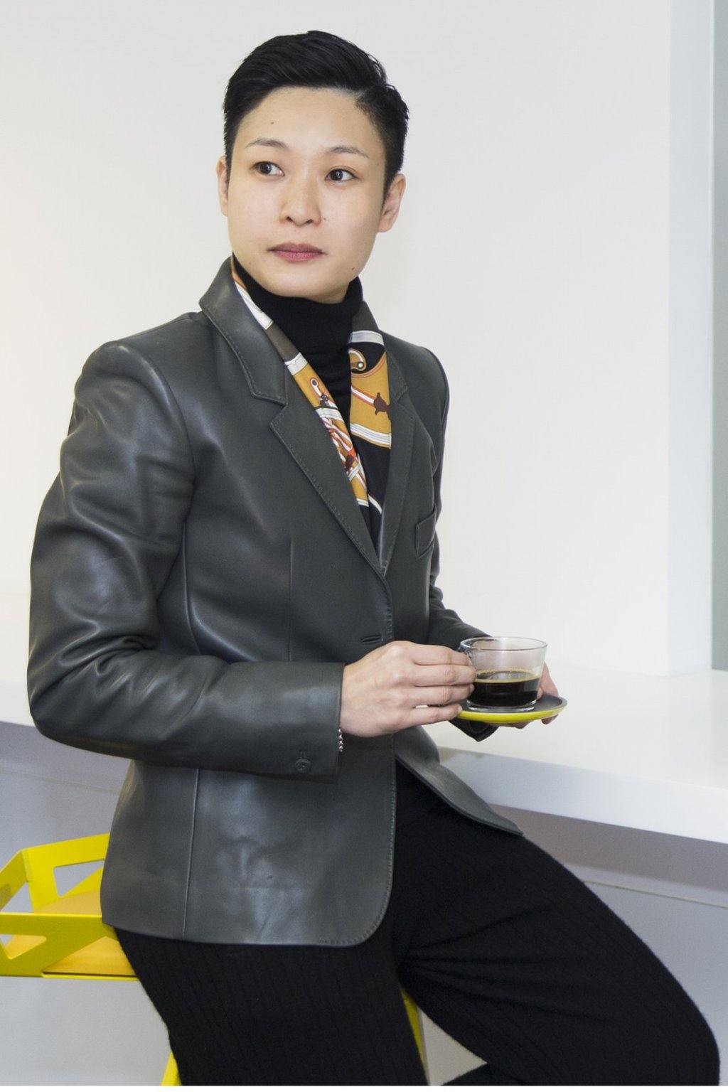 Wong wears a black turtle-neck from Ralph Lauren and a grey leather jacket by Hermès. Photo: Michelle Wong Wong wears a black turtle-neck from Ralph Lauren and a grey leather jacket by Hermès. Photo: Michelle Wong