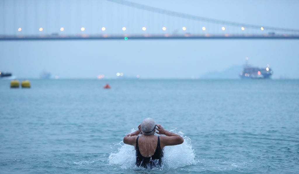 A swimmer at Lido Beach, undeterred by the cold weather. Photo: Winson Wong