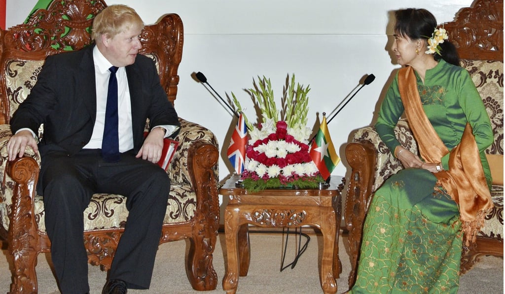 Johnson with Myanmar’s unofficial leader Aung San Suu Kyi. Photo: EPA