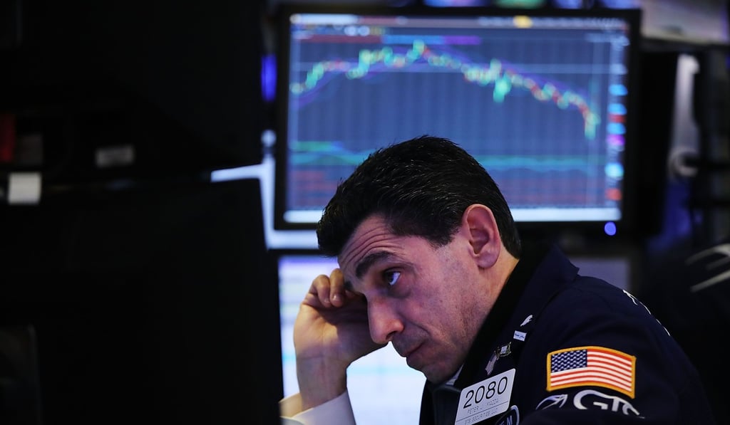 Traders work on the floor of the New York Stock Exchange on February 5, 2018. Photo: Getty Images/AFP