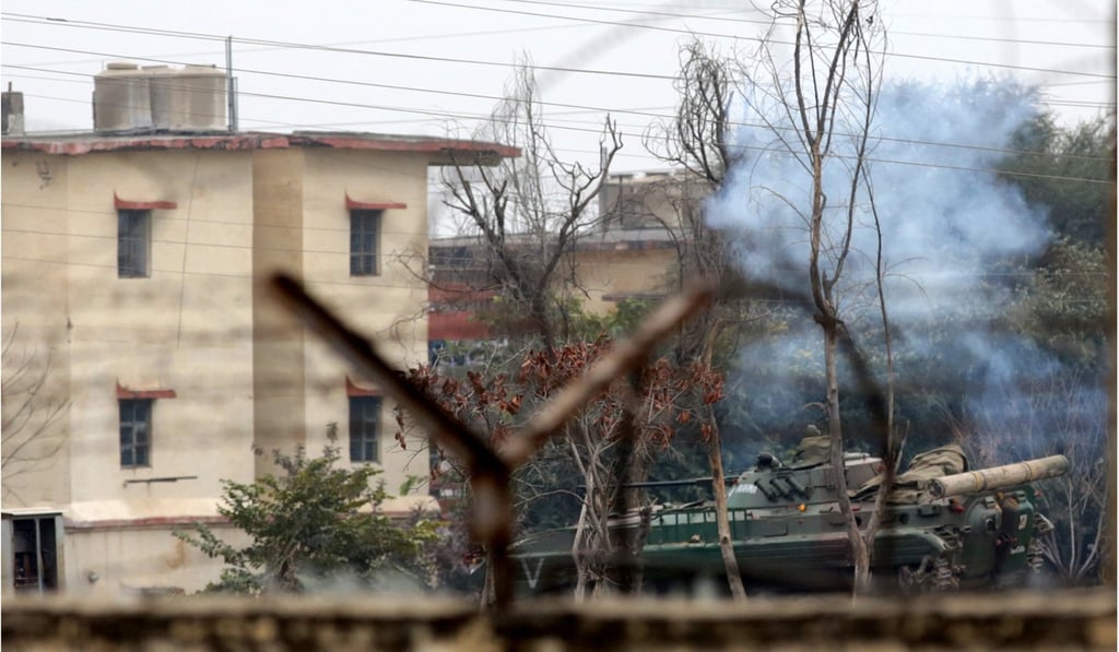 An Indian Army tank moves outside the army family quarters where terrorists are believed to be holed up, during an attack on Sunjwan Military station in Jammu, the winter capital of Kashmir, India, on Sunday. Photo: EPA-EFE An Indian Army tank moves outside the army family quarters where terrorists are believed to be holed up, during an attack on Sunjwan Military station in Jammu, the winter capital of Kashmir, India, on Sunday. Photo: EPA-EFE