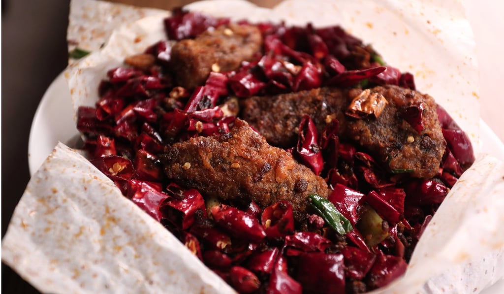 Deep-fried paper wrapped beef. Photo: Jonathan Wong