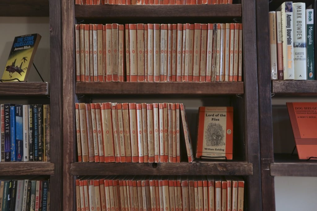 Penguin classics on the shelves of Bleak House Books.