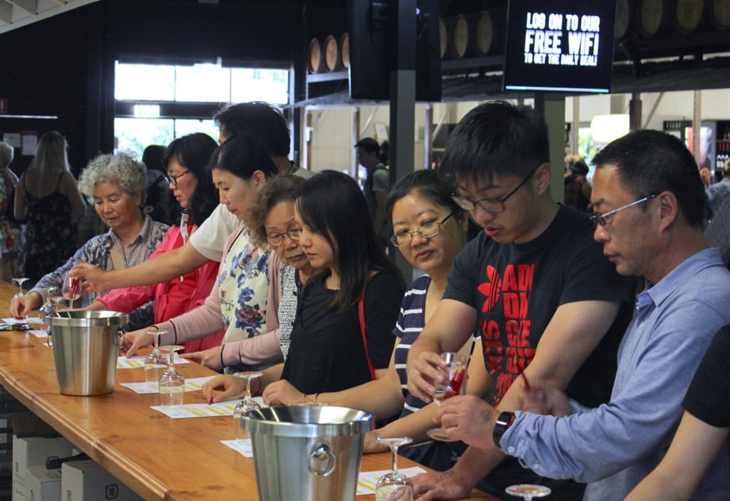 Chinese tourists sample wine at McGuigan Winery in the Hunter Valley in Australia. China is the world’s fastest growing wine market. Photo: Reuters