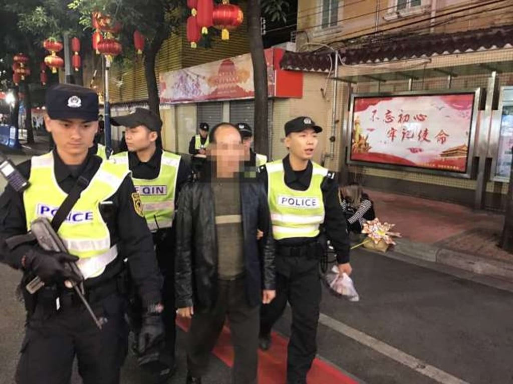 After this suspect was spotted by a surveillance camera at a flower market in Guangzhou police were able to quickly apprehend him. Photo: Handout