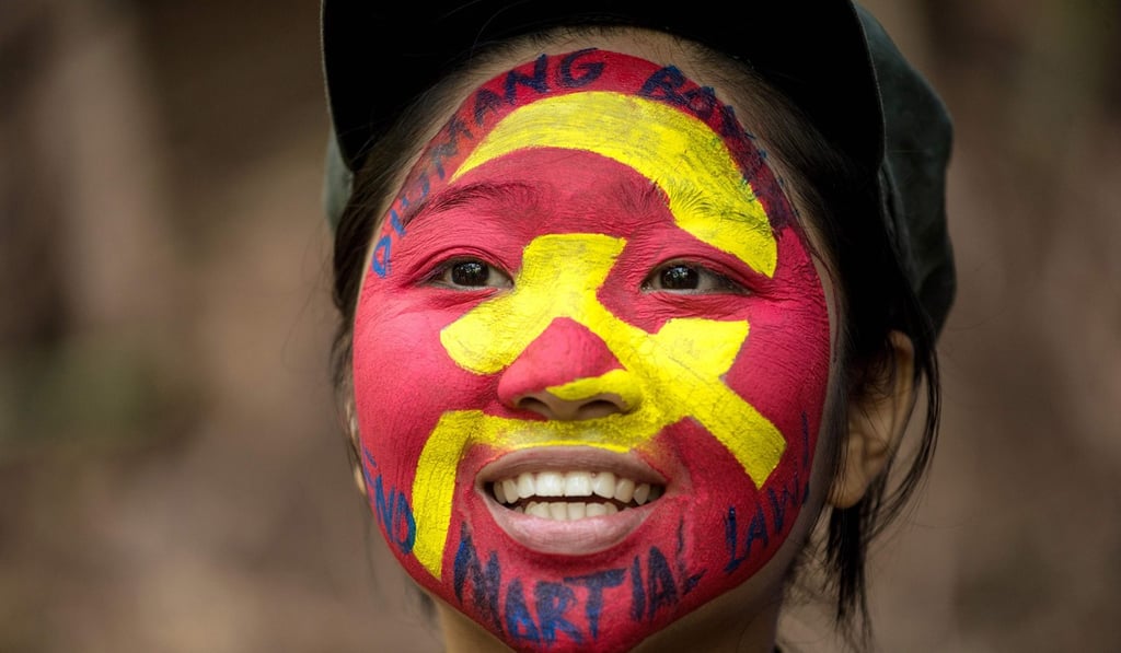 Ka Kathryn, a 25-year-old from a middle-class family, who is a guerilla of the New People's Army (NPA) in the Sierra Madre mountain range, located east of Manila. Photo: AFP