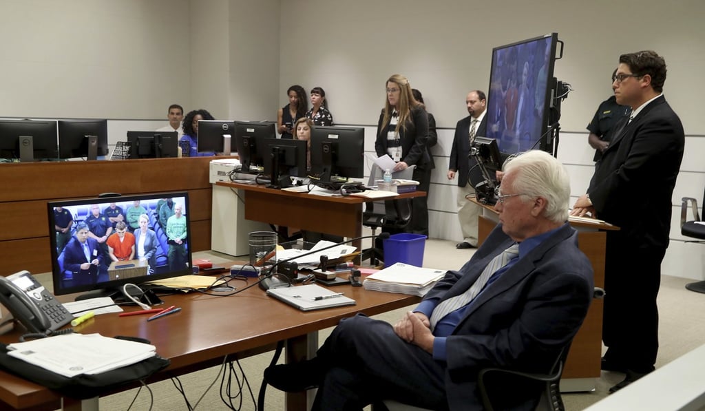 Cruz is seen on monitors during his bail hearing. He was described as ‘a broken human being’ by his public defender. Photo: Pool/South Florida Sun-Sentinel via AP. Cruz is seen on monitors during his bail hearing. He was described as ‘a broken human being’ by his public defender. Photo: Pool/South Florida Sun-Sentinel via AP.