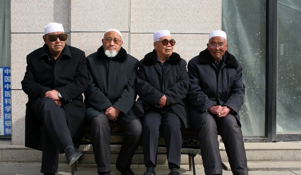 Men wait for afternoon prayers to begin at a mosque in China's Linxia, Gansu province, home to a large population of ethnic minority Hui Muslims, February 1, 2018. Picture taken February 1, 2018. REUTERS/Michael Martina