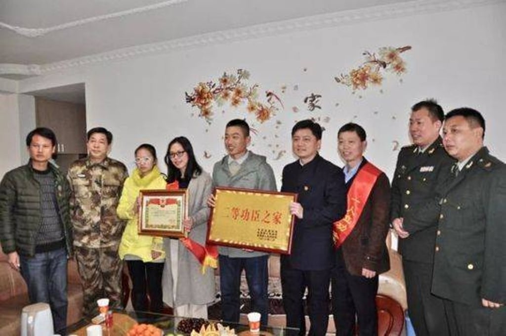 Gong and his family celebrate at their home in Fuzhou. Photo: 163.com Gong and his family celebrate at their home in Fuzhou. Photo: 163.com