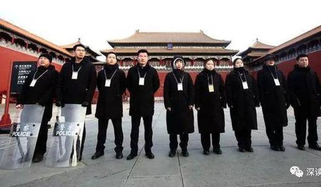 Despite the rise of technology, the Forbidden City still needs a squad of officers to ensure its security. Photo: 163.com