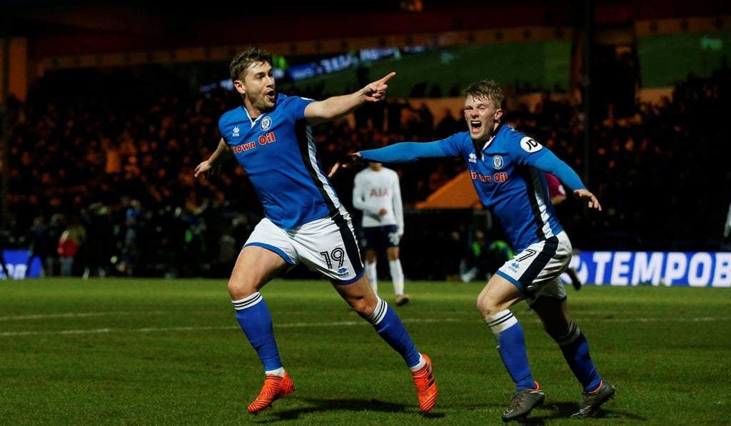 Davies celebrates his goal with the home fans. Photo: Reuters