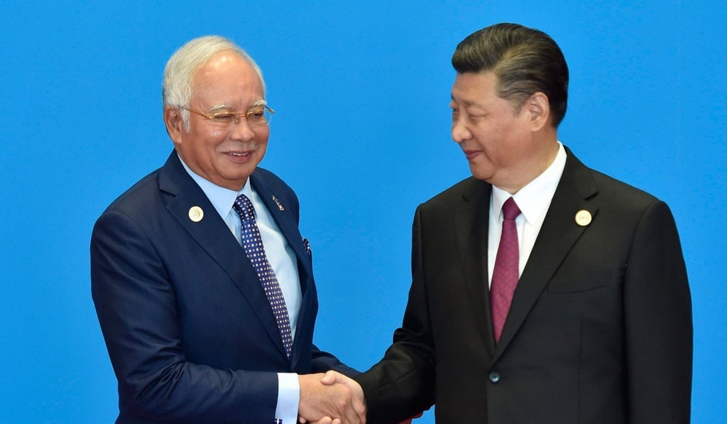Will Xi Jinping sweeten his demand to Malaysian Prime Minister Najib Razak for the return of 11 Uygur prisoners? Photo: AFP