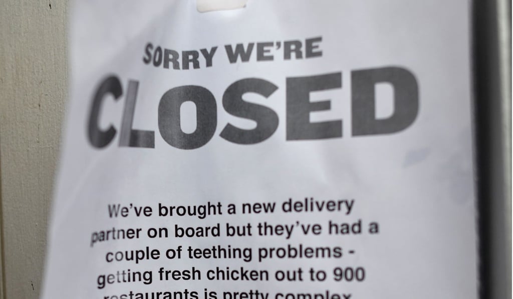 A sign outside a closed KFC fast food store in south London explains the closure is due to a shortage of fresh chicken. Photo: AFP A sign outside a closed KFC fast food store in south London explains the closure is due to a shortage of fresh chicken. Photo: AFP