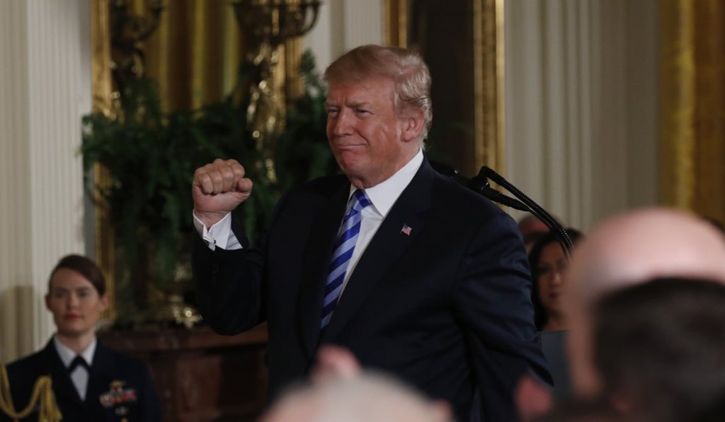 US President Donald Trump (seen on Tuesday at a Public Safety Medal of Valor awards ceremony) has been broadly pro-gun, but appears to be changing his beliefs somewhat in the wake of the Florida school shooting. Photo: Reuters