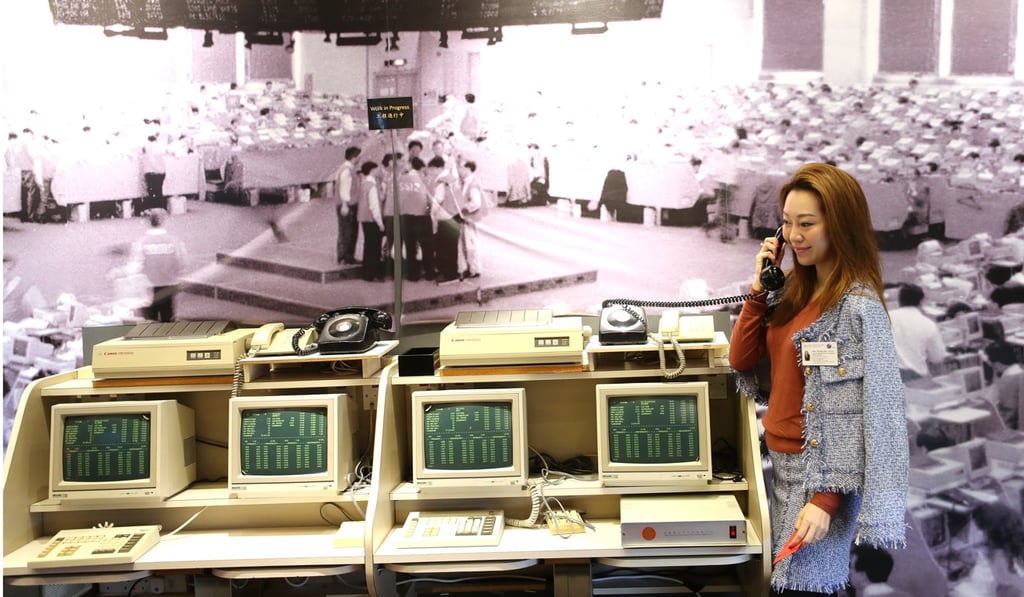 A visitor at the exhibition of the Hong Kong Financial History at the Hong Kong Exchange Exhibition Hall Grand Opening and Ceremony in Central. Photo: Winson Wong