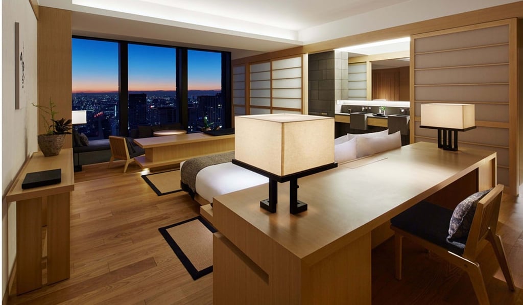 Aman Tokyo’s tower-top location affords stunning aspects of the city’s skyline and Mount Fuji beyond.
