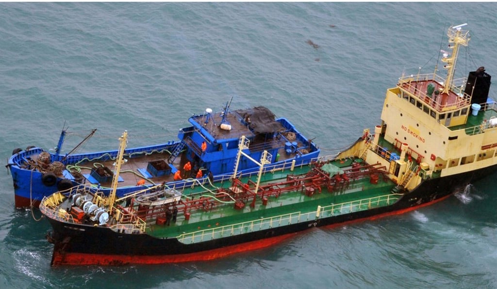 This February 16, 2018 photo released by Japan's Ministry of Defence, shows what it says North Korean-flagged tanker Yu Jong 2, bottom, and Min Ning De You 078 lying alongside in the East China Sea. Photo: AP This February 16, 2018 photo released by Japan's Ministry of Defence, shows what it says North Korean-flagged tanker Yu Jong 2, bottom, and Min Ning De You 078 lying alongside in the East China Sea. Photo: AP