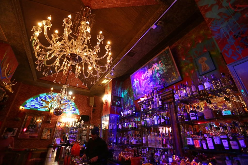 Splashes of paint and scrawled graffiti cover the interior. Photo: Xiaomei Chen