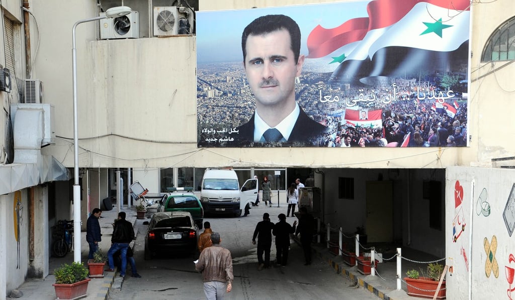 A giant poster of President Bashar al-Assad is seen at the entrance of a hospital in Damascus, capital of Syria, on Tuesday. Photo: Xinhua A giant poster of President Bashar al-Assad is seen at the entrance of a hospital in Damascus, capital of Syria, on Tuesday. Photo: Xinhua
