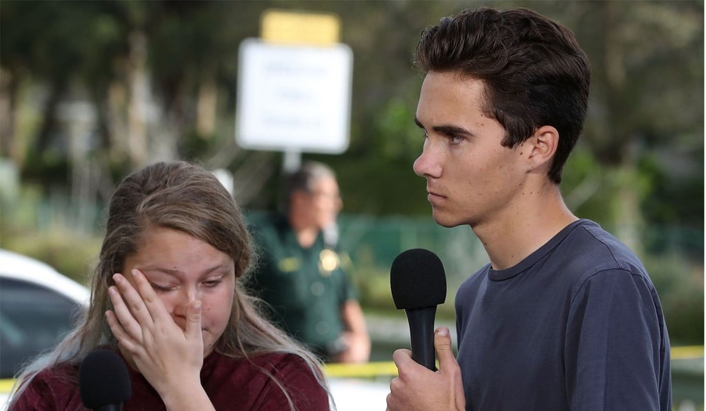 Students Kelsey Friend (left) and David Hogg recount their stories about the mass shooting at the Marjory Stoneman Douglas High School where 17 people were killed. Photo: AFP