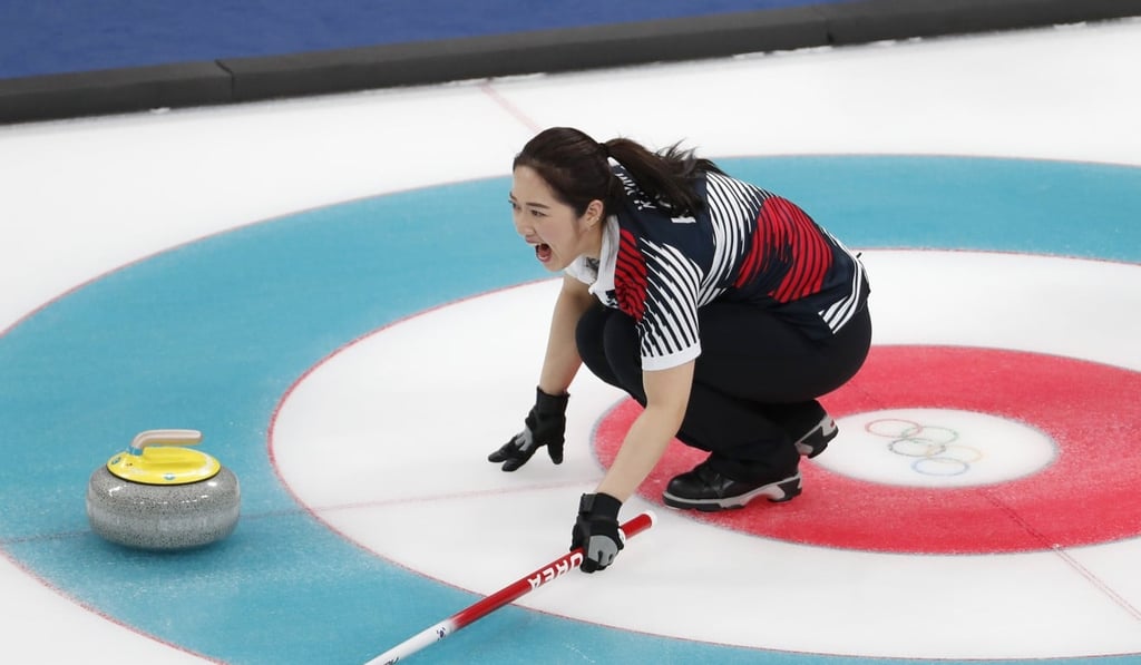 Vice-skip Kyeongae Kim of South Korea shouts to her teammates. Photo: Reuters
