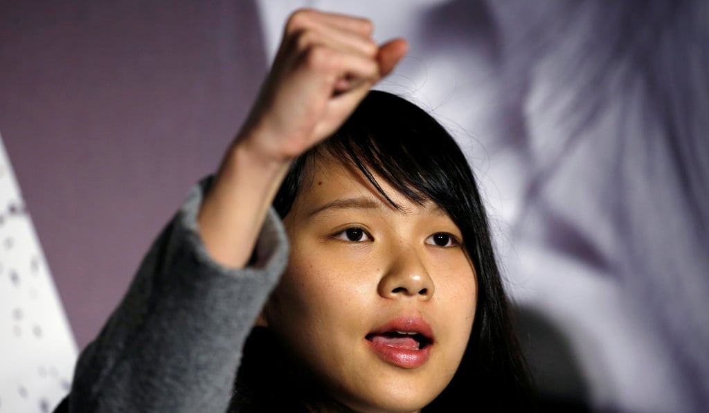 Pro-democracy activist Agnes Chow, 21, chants slogans at a rally after she was banned from running in the Legco by-election. Photo: Reuters