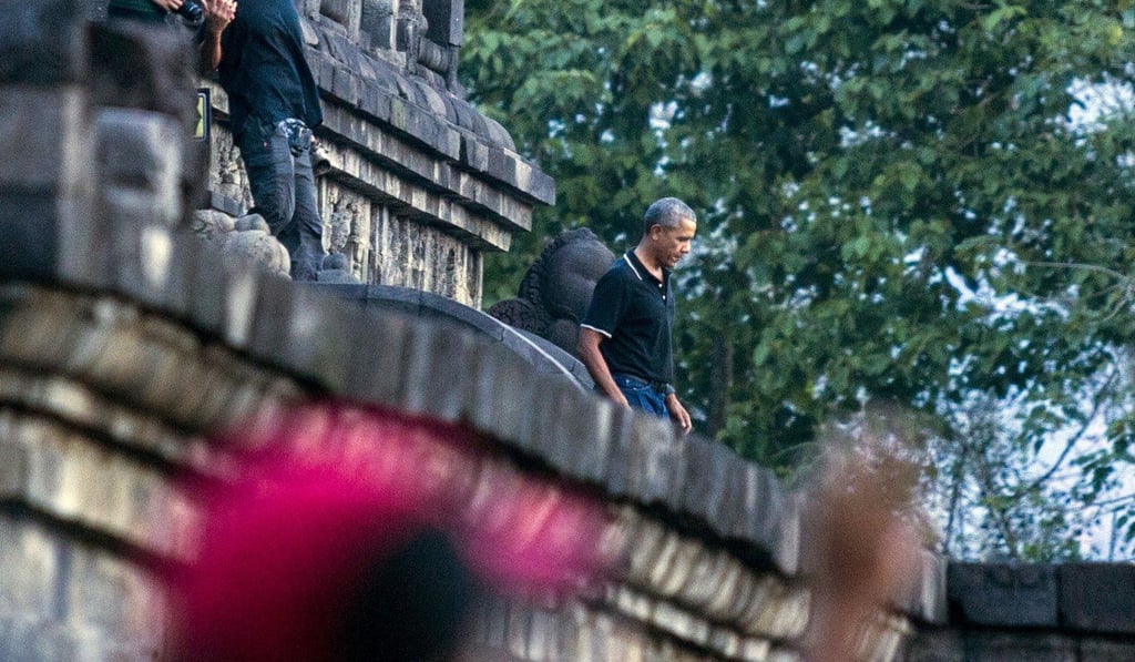Former US President Barack Obama walks down the stairs of Borobudur Temple in Magelang, Central Java, Indonesia. Photo: AP