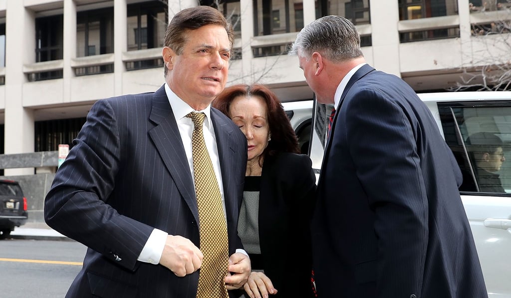Gates acted as the deputy for Paul Manafort (seen in January with his wife Kathleen outside the Prettyman Federal Courthouse in Washington) on Trump’s team, and even survived Manafort’s initial resignation. Photo: Getty Images North America via AFP