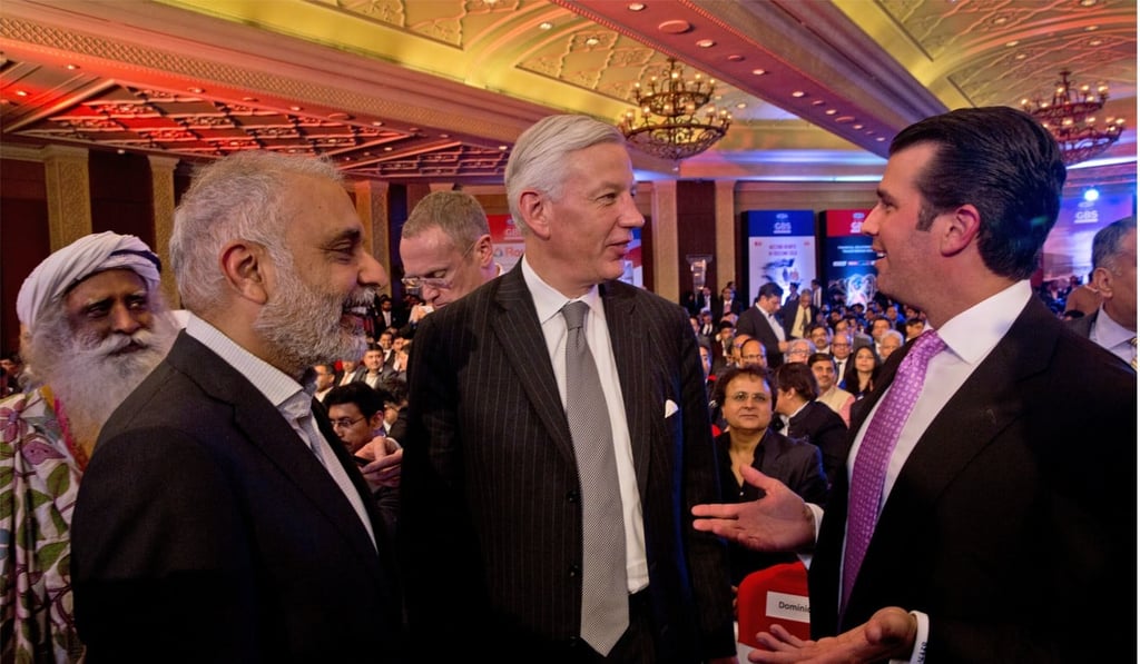 Donald Trump Jnr speaks with the managing director of McKinsey & Company, Dominic Barton (centre) and CEO of Uber Dara Khosrowshahi (second from left) during a global business summit in New Delhi, India, on Friday. Photo: AP