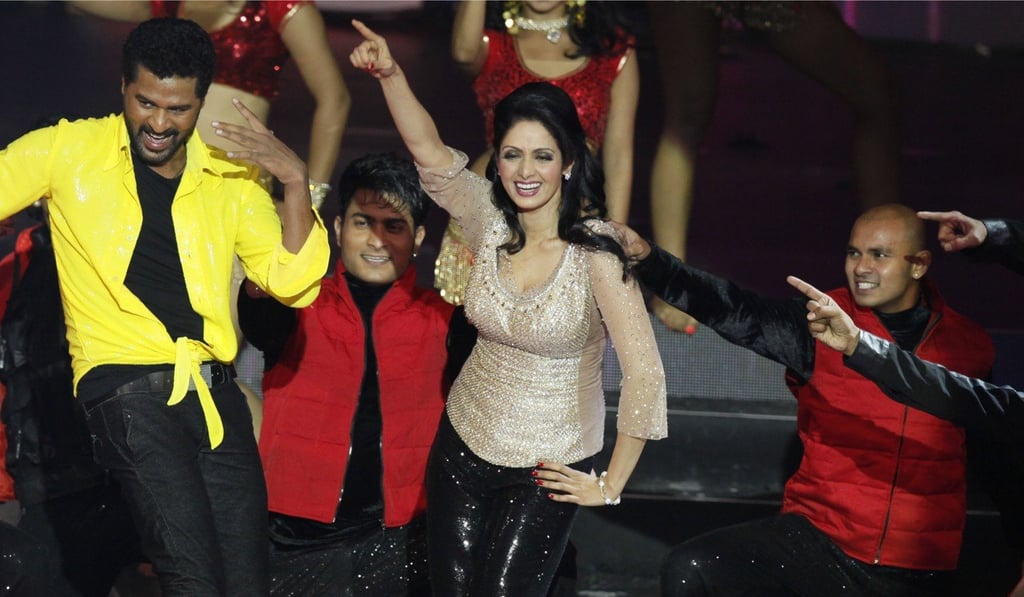 Bollywood actors Sridevi, centre, and Prabhu Deva, left in yellow, performing during the International Indian Film Academy (IIFA) awards in Macau in 2013. File photo: AP Bollywood actors Sridevi, centre, and Prabhu Deva, left in yellow, performing during the International Indian Film Academy (IIFA) awards in Macau in 2013. File photo: AP