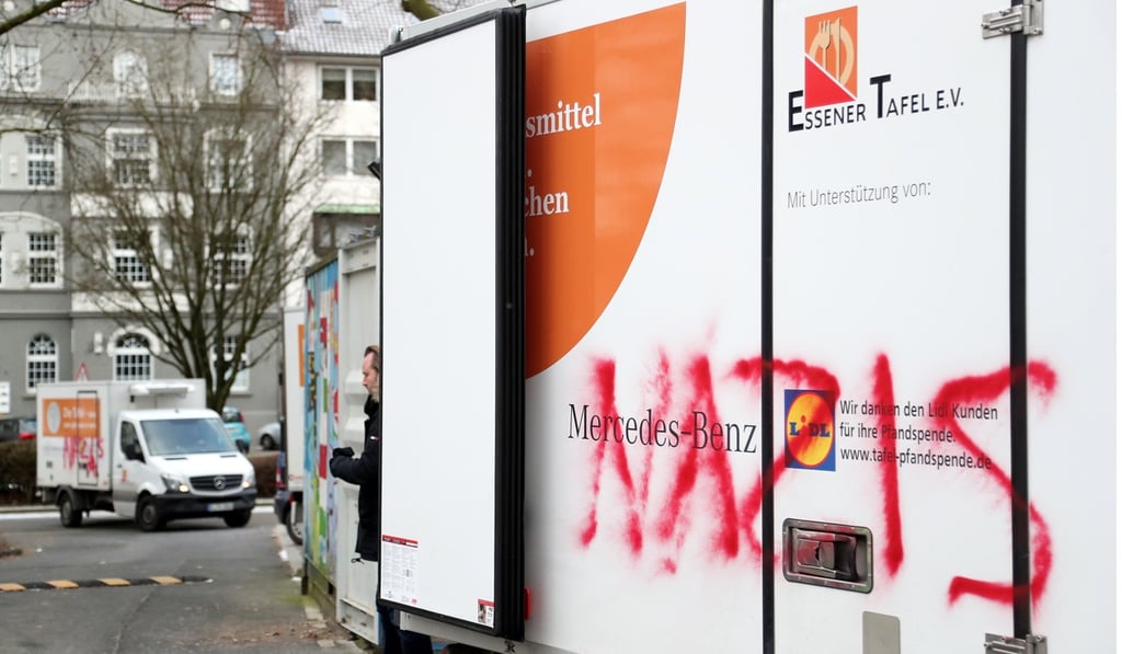 Vandalised vehicles delivering food at the Tafel in Essen, Germany. Photo: EPA