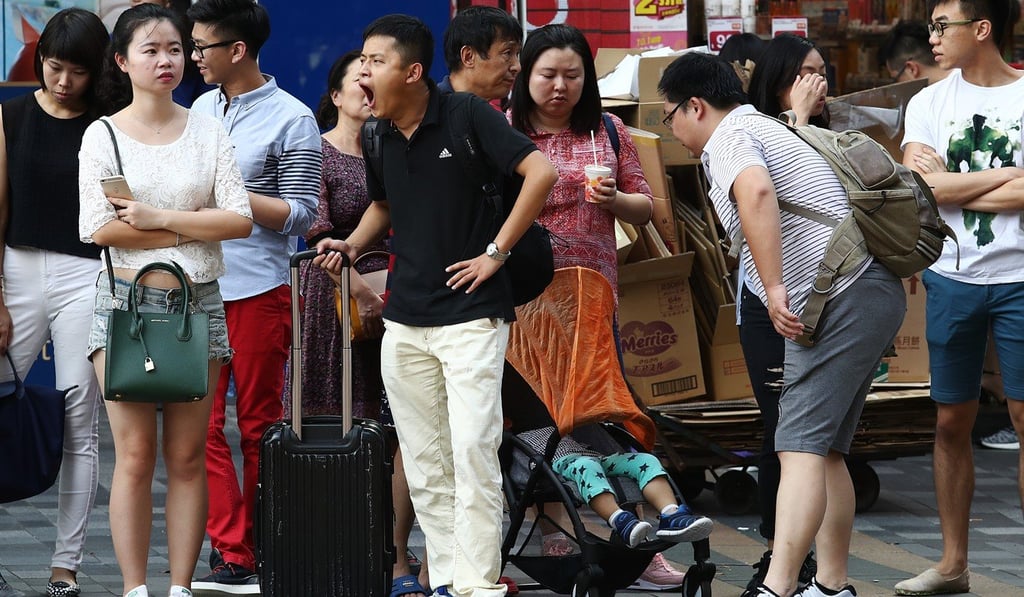 Tourists at popular shopping hub Tsim Sha Tsui. Photo: Nora Tam
