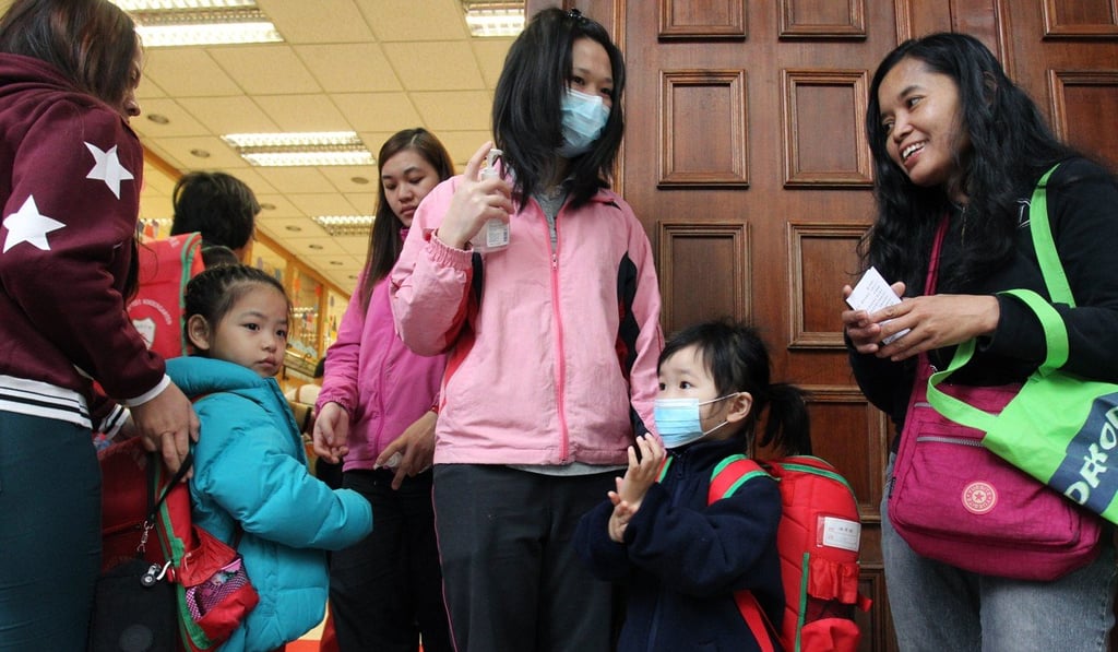 Pupils wash their hands before entering Tai Po Baptist Kindergarten. Photo: May Tse