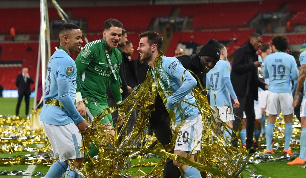 City players enjoy their triumph. Photo: EPA City players enjoy their triumph. Photo: EPA
