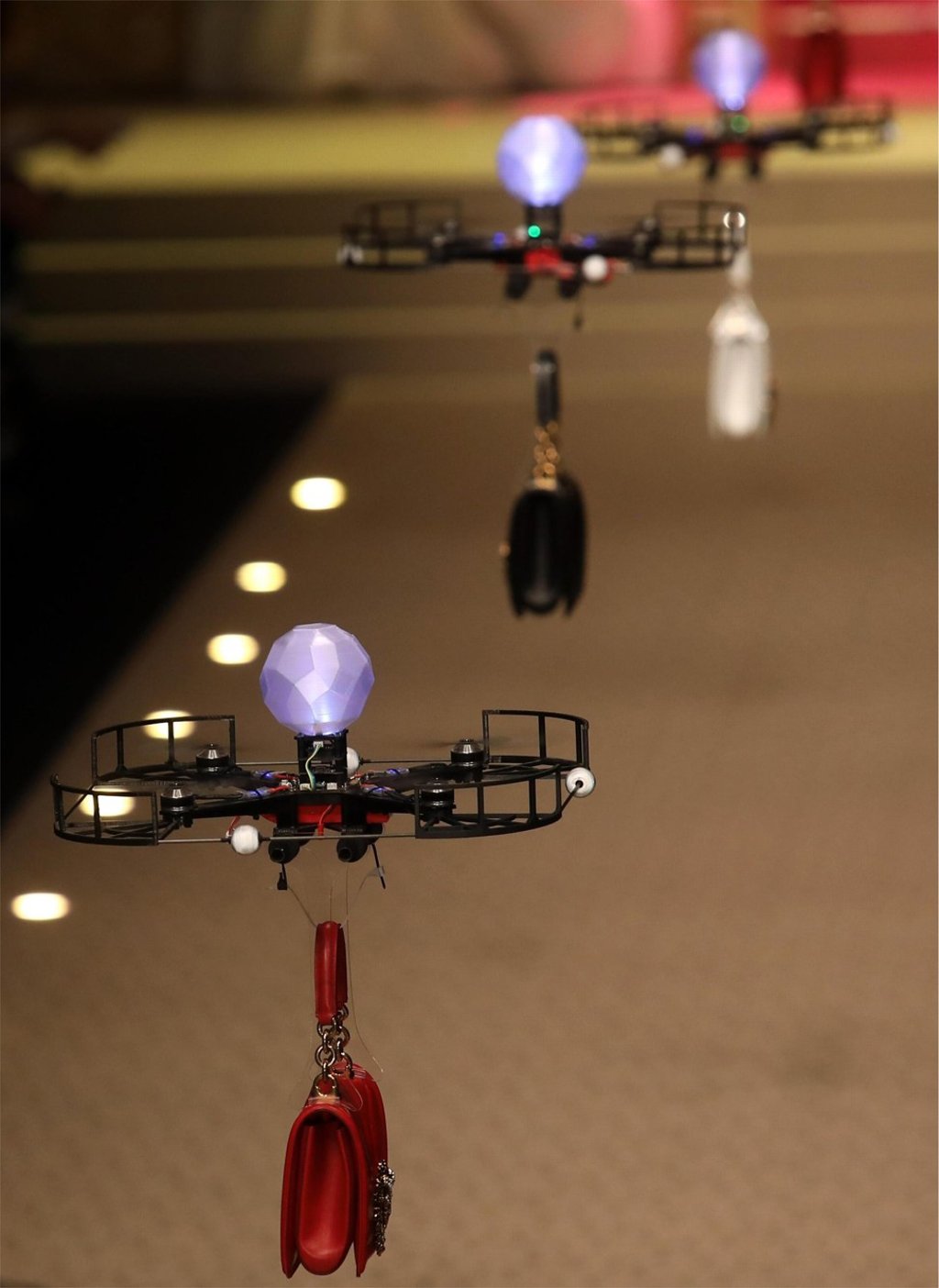 Handbags are presented by drones during Dolce and Gabbana’s show at Milan Fashion Week. Photo: EPA Handbags are presented by drones during Dolce and Gabbana’s show at Milan Fashion Week. Photo: EPA
