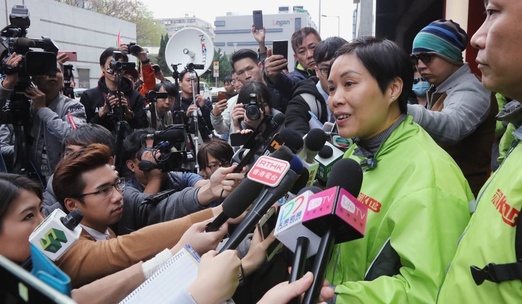 Yip leads a group of bus drivers seeking higher pay and less job pressure. Photo: Felix Wong