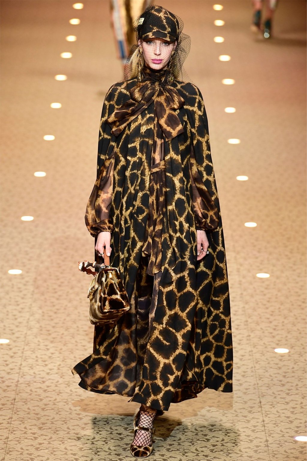 An animal print cape in Dolce & Gabbana’s runway show in Milan. Photo: AFP An animal print cape in Dolce & Gabbana’s runway show in Milan. Photo: AFP