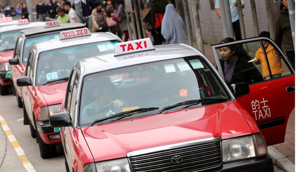 The sharp candy red of urban taxis in Kowloon Tong. Photo: Felix Wong