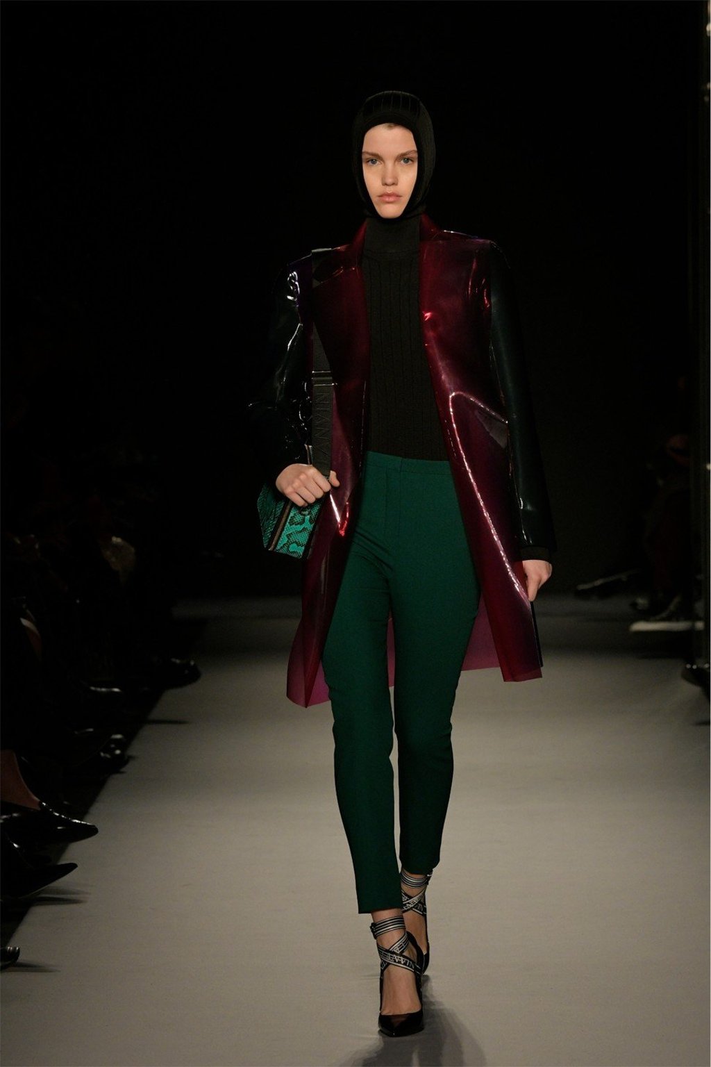 A jacket with a sleek texture is paired with slim green pants in this look from Lanvin. Photo: Xinhua